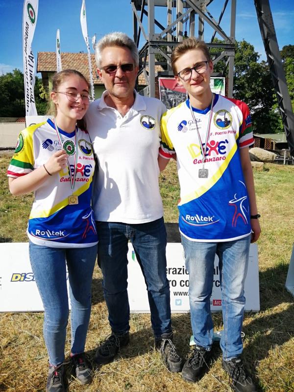 images Campionati italiani tiro di campagna. Gli Arcieri del club Lido sul tetto d'Italia: doppio successo per i fratelli Poerio Piterà   