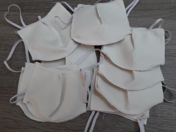 images Coronavirus. Nella Locride i migranti cuciono le mascherine